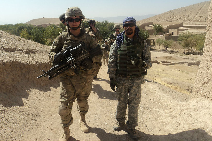 Sajad Kazemi, right, served with Canadian troops in Kandahar province in 2009-2010.