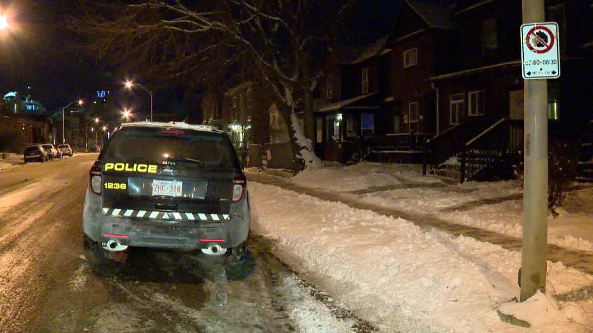 Calgary police outside a Beltline multi-family residence were a man was assaulted Dec 17, 2015