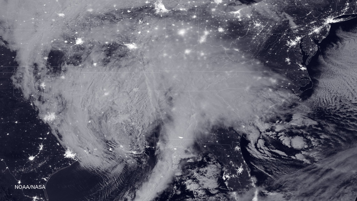 A satellite image shows the blizzard moving into the eastern United States on Jan. 22, 2016.