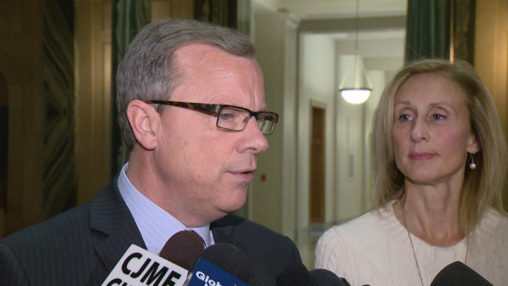Saskatchewan Premier Brad Wall says bringing in a carbon tax would "kneecap" an already struggling economy.