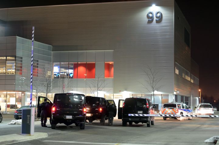 Police vehicles arrive at the Air Canada operations centre in Brampton, Ont. after a man was stabbed there on Jan. 6, 2016.