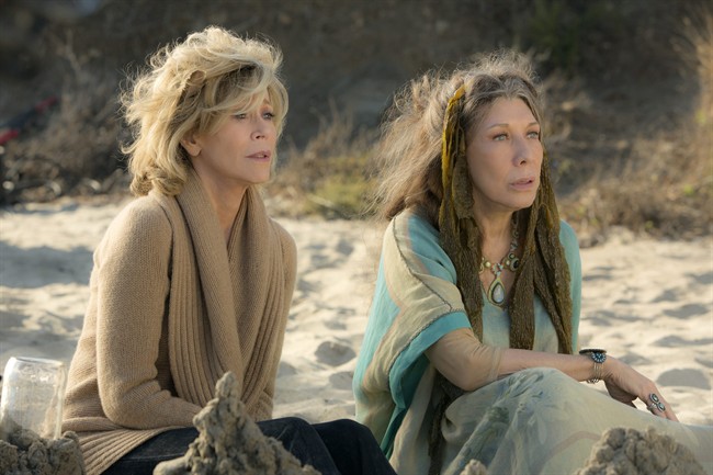 This photo provided by Netflix shows Jane Fonda, left, and Lily Tomlin in the Netflix Original Series “Grace and Frankie.”