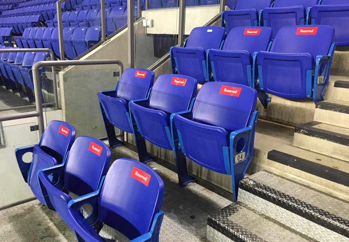 Seats reserved for the Kurdi family at Thunderbird Arena for a University of British Columbia hockey game. 