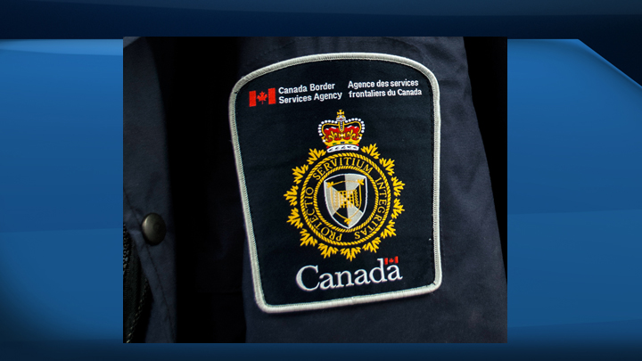 The shoulder-flash of a Canada Border Services Agency uniform.