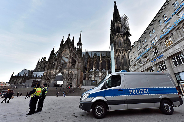 Police patrol in front of the main train station and the cathedral in Cologne, Germany, Monday, Jan. 18, 2016. 