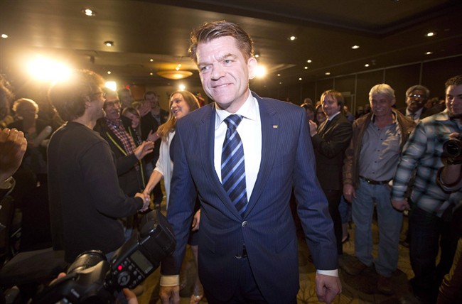 Alberta Wildrose Leader Brian Jean walks through the crowd after being declared the official opposition in Fort McMurray, Alta., on Tuesday May 5, 2015. 