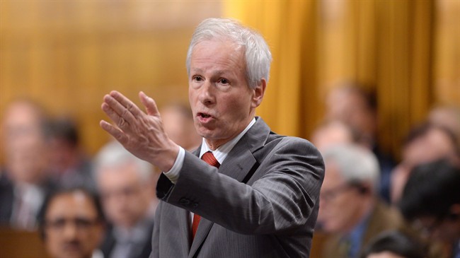 Foreign Affairs Minister Stephane Dion responds during question period in the House of Commons, on Parliament Hill, in Ottawa, on December 8, 2015.
