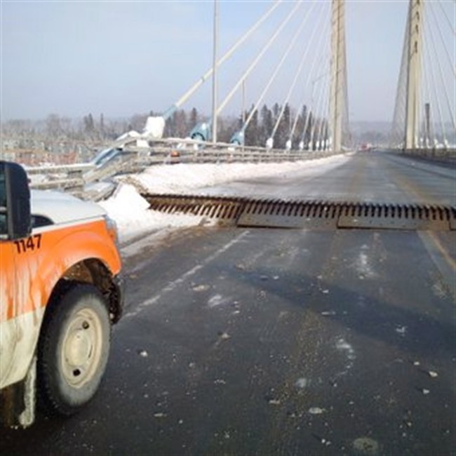 The Ontario Provincial Police posted this photo on Twitter on the damaged Nipigon River Bridge on Sunday, Jan. 10, 2016. 