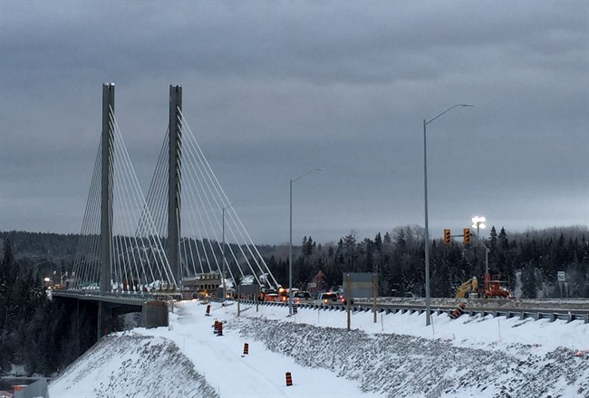 Works continues on the damaged Nipigon River Bridge in Nipigon, Ont., Thursday, Jan.14, 2016. 