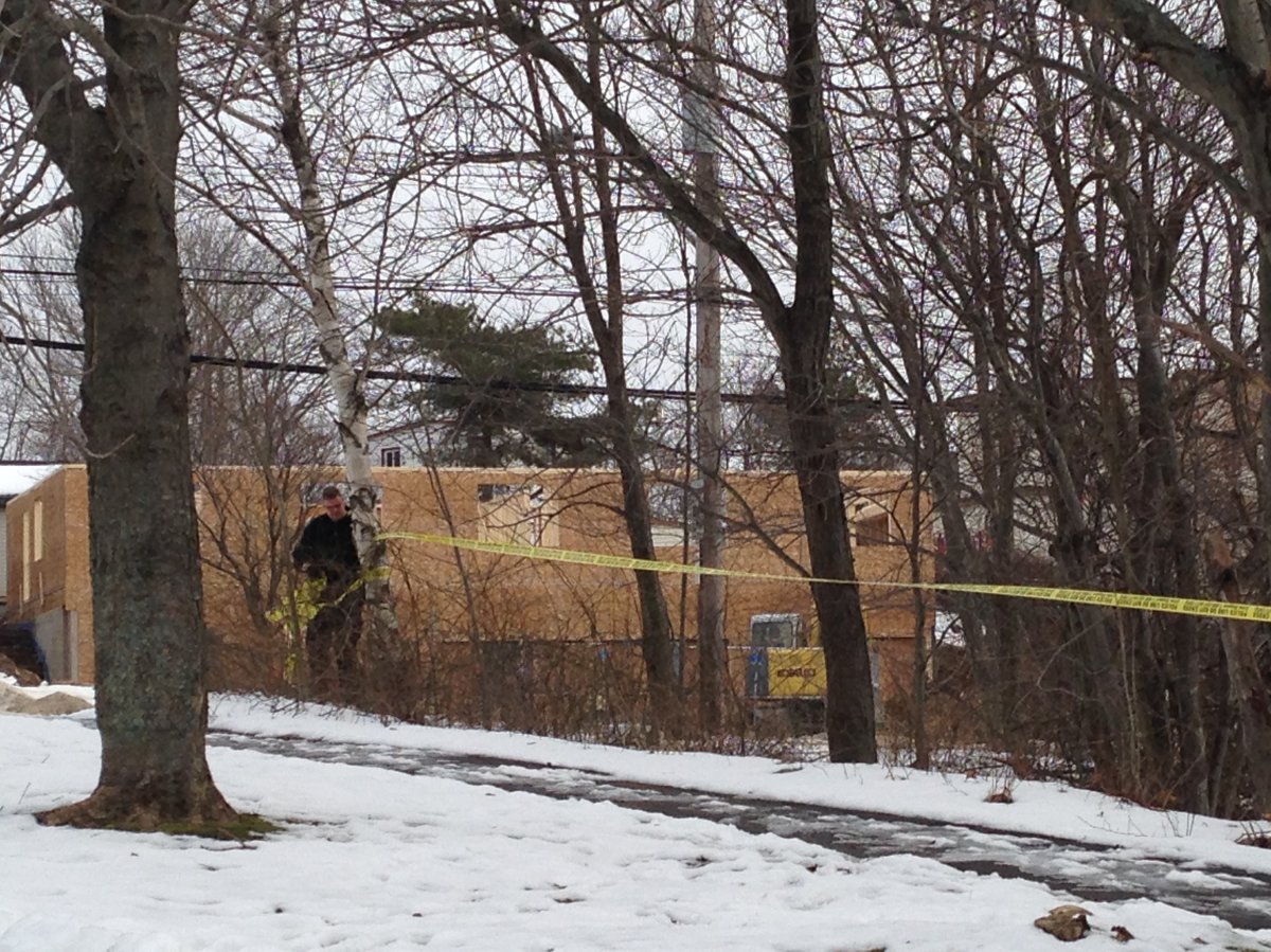 Police secure the area where a body was found off Pleasant Street in Dartmouth on January 9, 2016.