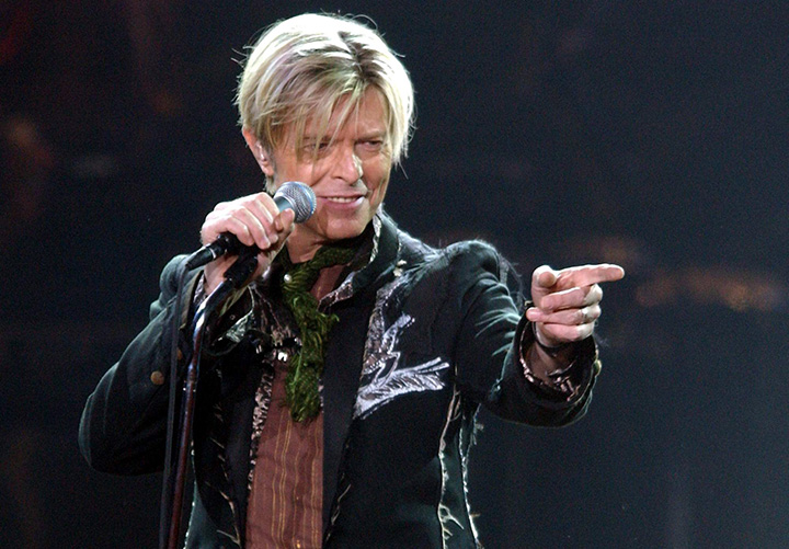 A file photograph showing British rock legend David Bowie performing in Hamburg, Germany, 16 October 2003. 