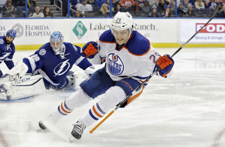 Edmonton Oilers center Leon Draisaitl (29), of Germany, celebrates after scoring past Tampa Bay Lightning goalie Andrei Vasilevskiy (88), of Russia, during the third period of an NHL hockey game Tuesday, Jan. 19, 2016, in Tampa, Fla. The Lightning won the game 6-4. 