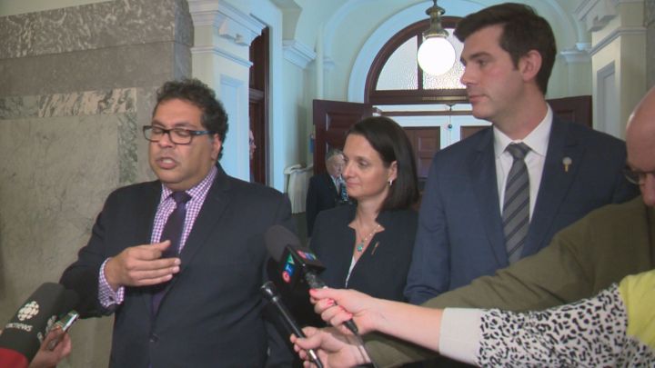 Calgary Mayor Naheed Nenshi, Municipal Affairs Minister Danielle Larivee and Edmonton Mayor Don Iveson speak to reporters after meeting with the NDP cabinet on Jan. 26, 2015.