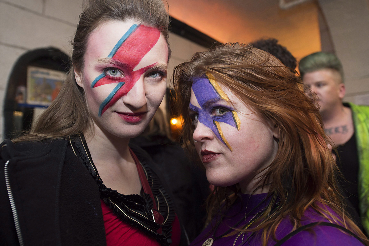  Bowie fans pose for a photograph as they wait to hear collaborators Tony Visconti and Mick "Woody" Woodmansey bring their acclaimed group Holy Holy performing Bowie's 1970 album The Man Who Sold The World in its entirety, along with other Bowie classics from the Ziggy Stardust and the Spiders From Mars era in Toronto on Tuesday.
