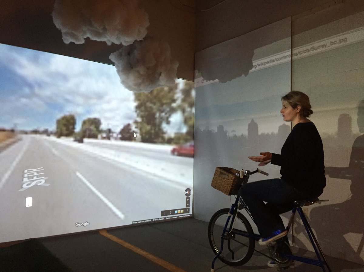 Megan Smith uses a modified bicycle to travel across the country virtually.