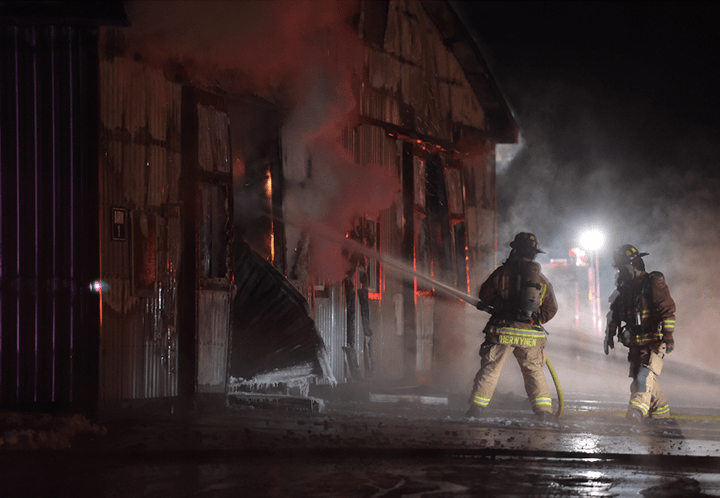 Firefighters battle a barn fire at Classy Lane Stables in Puslinch Township on Jan. 5, 2016.