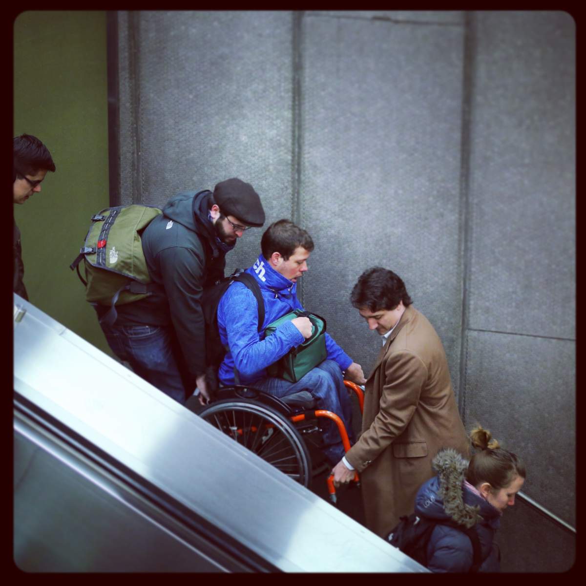 Trudeau helps on escalator