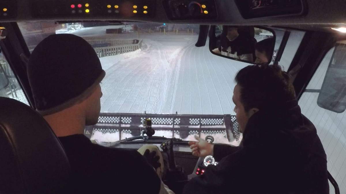 Jordan Witzel tries his hand at driving a snow groomer at Canada Olympic Park.
