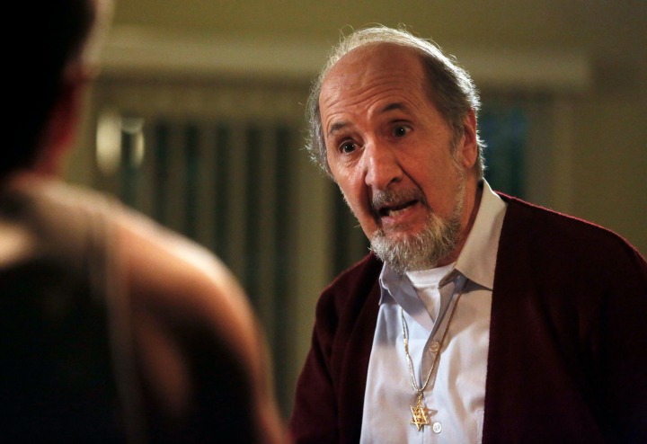 This photo provided by courtesy of NBC shows Richard Libertini as Saul Hodiak in season one of the TV series, "Aquarius." The comedic character actor Libertini has died at age 82. Libertini's ex-wife Melinda Dillon says he died Jan. 7, 2016, after a 2-yearlong battle with cancer. 