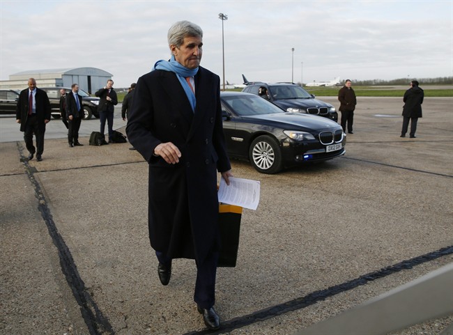 U.S. Secretary of State, John Kerry, departs London on his way to Vienna, Austria for what is expected to be "implementation day" of the Iran nuclear deal following the release of the final report issued by the International Atomic Energy Agency (IAEA) Saturday, Jan. 16, 2016. (Kevin Lamarque/Pool Photo via AP).