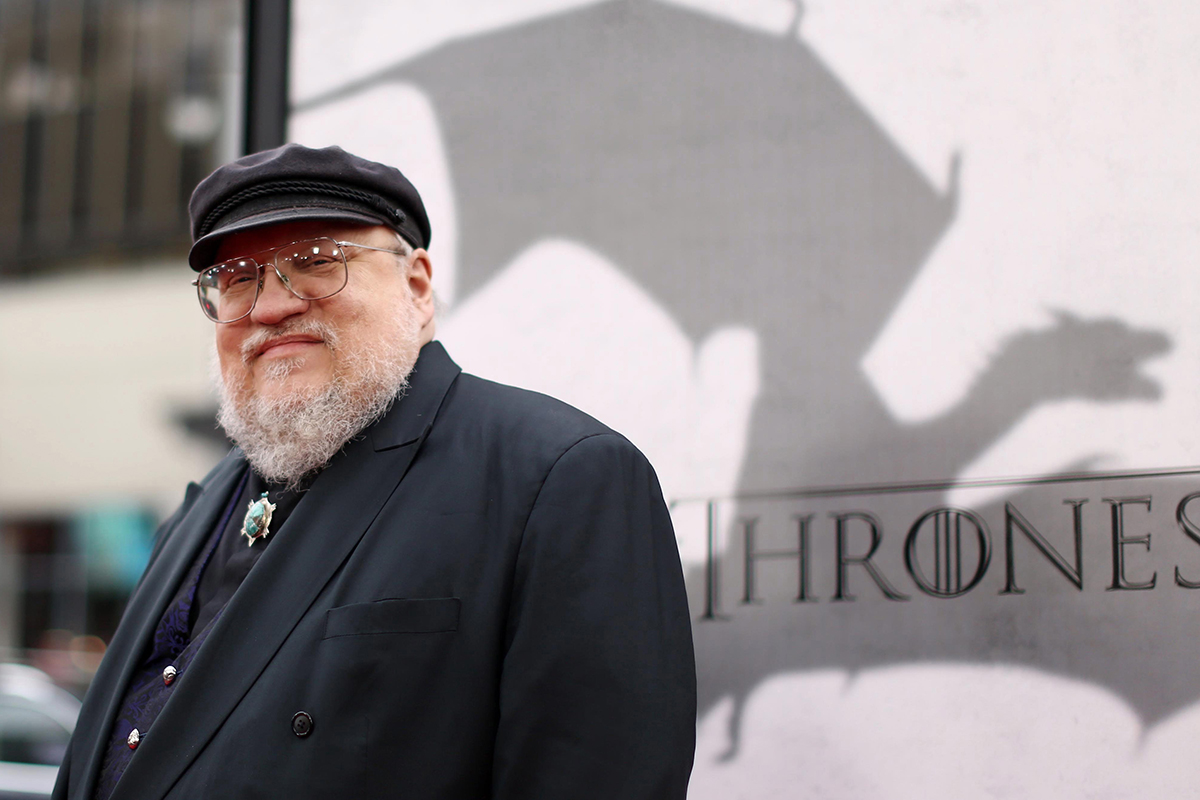 George R.R. Martin arrives at the premiere for the third season of the HBO television series "Game of Thrones" at the TCL Chinese Theatre in Los Angeles.