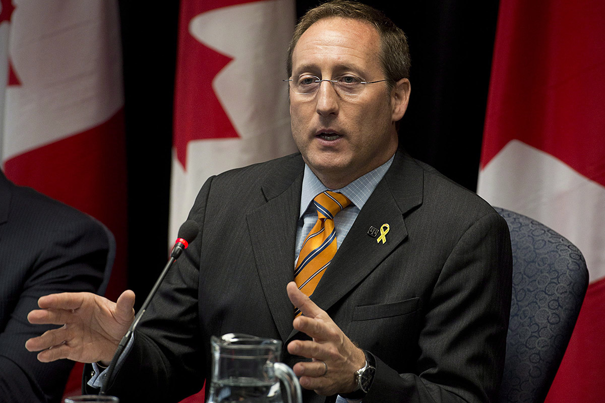 Justice Minister Peter McKay fields a question on the shale gas protest in New Brunswick as he attends a roundtable discussion on crime in Halifax on Friday, Oct.18, 2013. 