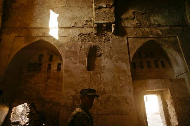 In this Nov. 7, 2008, photo, U.S. Army soldiers tour St. Elijah's Monastery on Forward Operating Base Marez on the outskirts of Mosul, Iraq.
