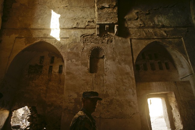 In this Nov. 7, 2008, photo, U.S. Army soldiers tour St. Elijah's Monastery on Forward Operating Base Marez on the outskirts of Mosul, Iraq.