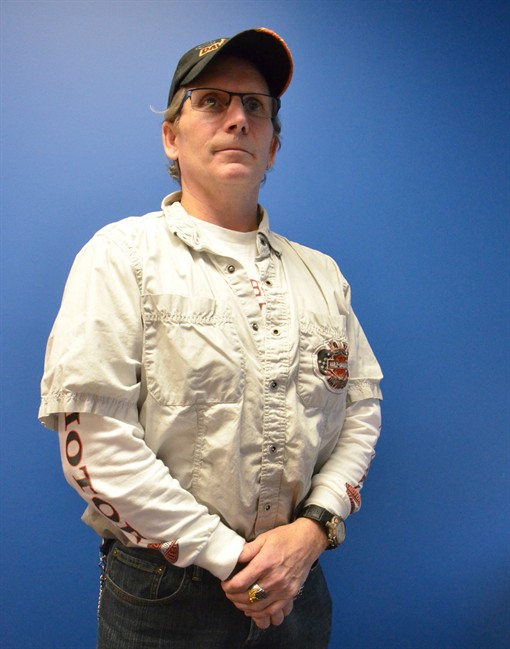 Even though he's been a civilian for more than two years, former warrant officer Wade Pear, pictured in Ottawa, on Dec. 14, 2015, faces a court martial for allegedly mouthing a schoolyard taunt to a junior officer at an official dinner.