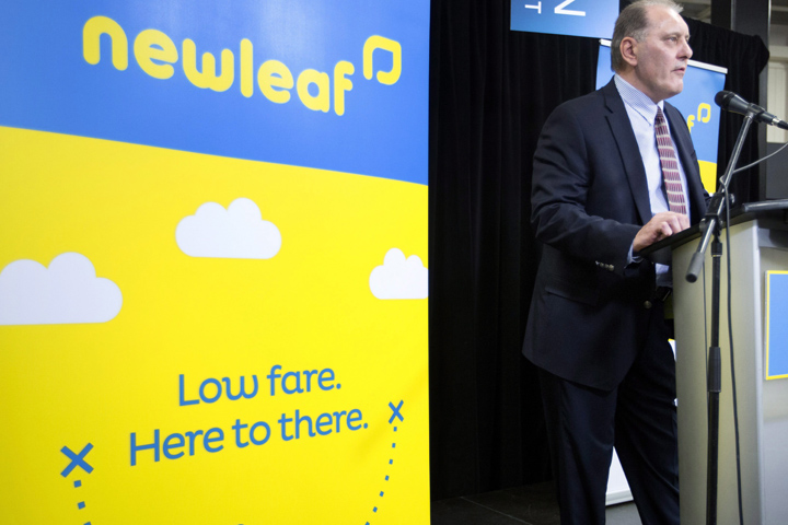 Dean Dacko, Chief Commercial Officer of NewLeaf Travel speaks at a press conference in the arrivals area of the John C. Munro Hamilton International Airport, on Wednesday, Jan. 6, 2016. 