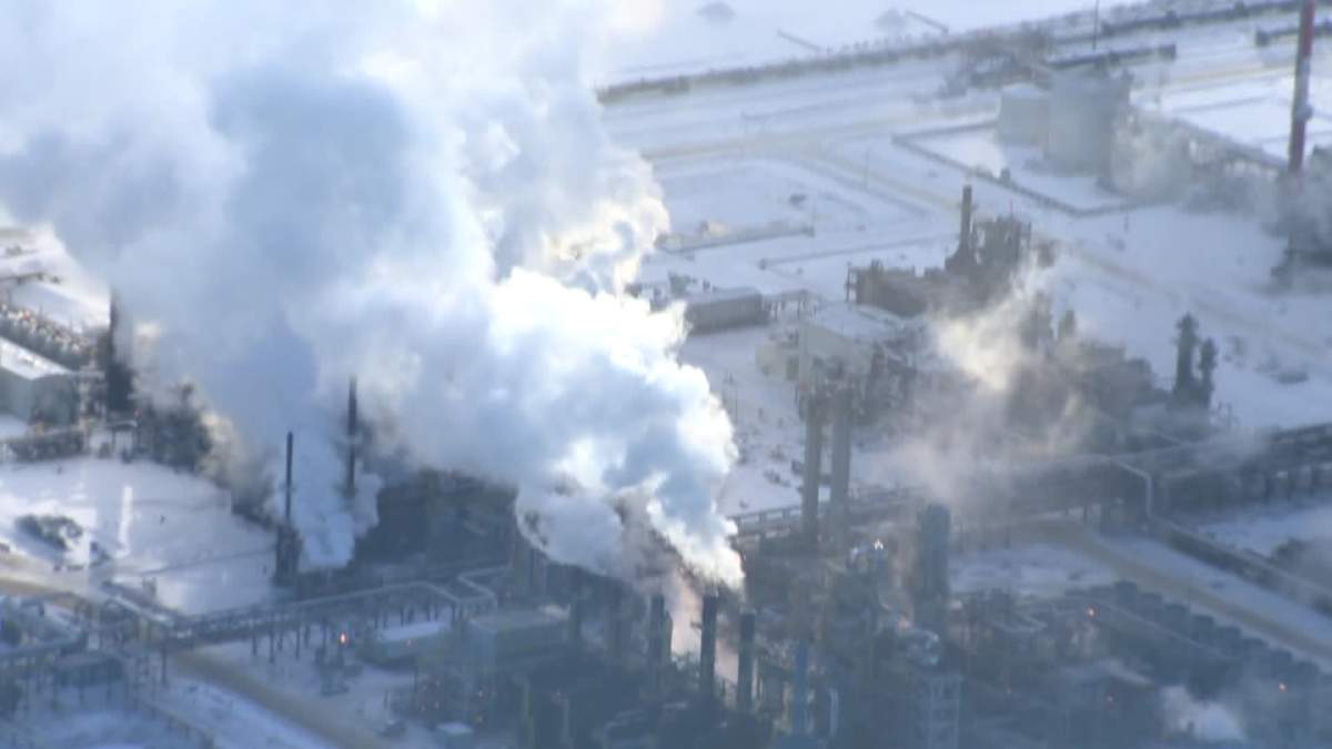 Half of a building's roof and wall was blown off during the explosion at Nexen's Long Lake facility.