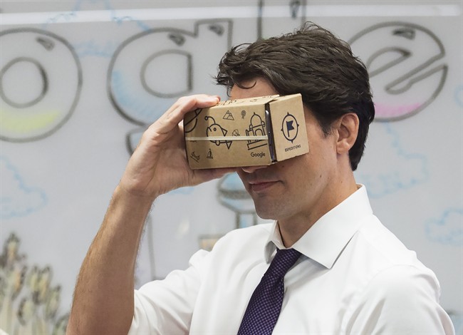 Prime Minister Justin Trudeau takes part in a virtual reality demonstration at Google Canada in Kitchener, Ont.