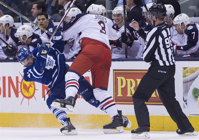 Toronto Maple Leafs centre Nazem Kadri (43) gets hit by Columbus Blue Jackets defenceman Seth Jones (3) during second period NHL hockey action in Toronto on Wednesday, January 13, 2016. 