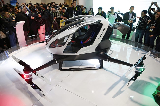 The EHang 184 autonomous aerial vehicle is unveiled at the EHang booth at CES International, Wednesday, Jan. 6, 2016, in Las Vegas. The drone is large enough to fit a human passenger. 