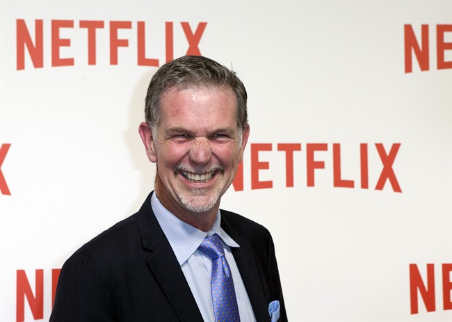In this Sept. 15, 2014, file photo, Netflix CEO Reed Hastings arrives for the 'Netflix' Launch Party in Paris. Hastings made the surprise announcement at the end of a presentation Wednesday, Jan. 6, 2016, in Las Vegas at CES, a showcase for gadgets and technology services. Netflix has begun streaming its Internet video service in 130 more countries, nearly completing its expansion a year ahead of schedule.