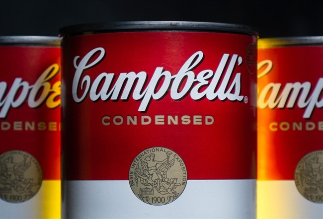 Cans of Campbell's soup are photographed in this file photo. Campbell Soup said it supports federal legislation that would establish a national labeling standard for products containing genetically modified ingredients. About three-quarters of the company's products have GMO ingredients. 