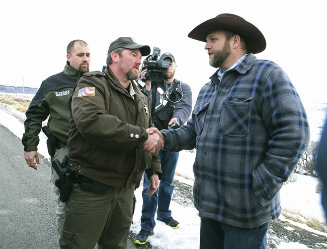 Harney County Sheriff Dave Ward meets with Ammon Bundy at a remote location outside the Malheur National Wildlife Refuge on Thursday, Jan. 7, 2016, near Burns, Ore. 