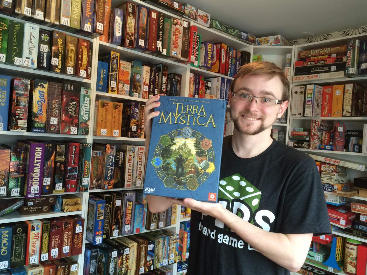 “Games Master” Trevor Godley shows off one of his favourites at Pip’s Board Game Cafe.