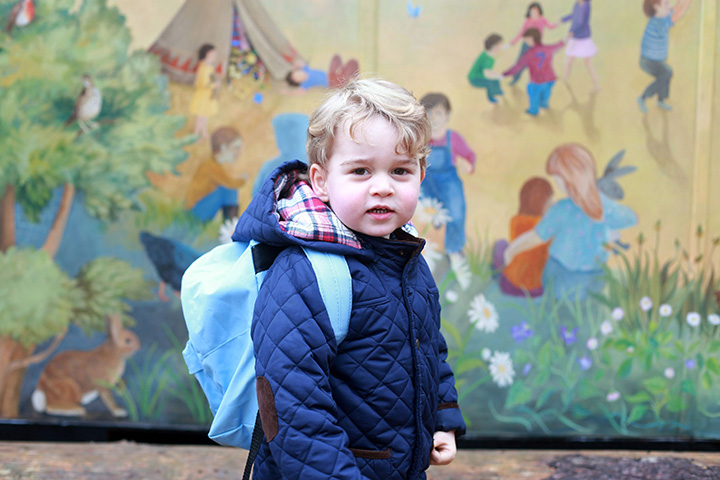 In this handout photograph provided by Kensington Palace on Wednesday, Jan. 6, 2016, taken by Kate, The Duchess of Cambridge, Prince George poses on his first day at the Westacre Montessori nursery school near Sandringham in Norfolk, England. 
