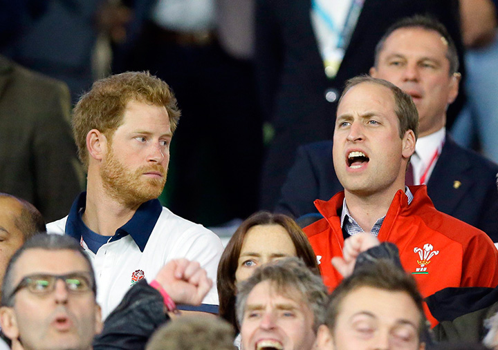 In this is a Saturday, Sept. 26, 2015 file photo, Prince William, right, sings the national anthem of Wales as Prince Harry looks on ahead of a rugby match at Twickenham Stadium, London. British lawmakers are debating Wednesday Jan. 13, 2016 a proposal to replace the royalist song as England's anthem for sporting events.  