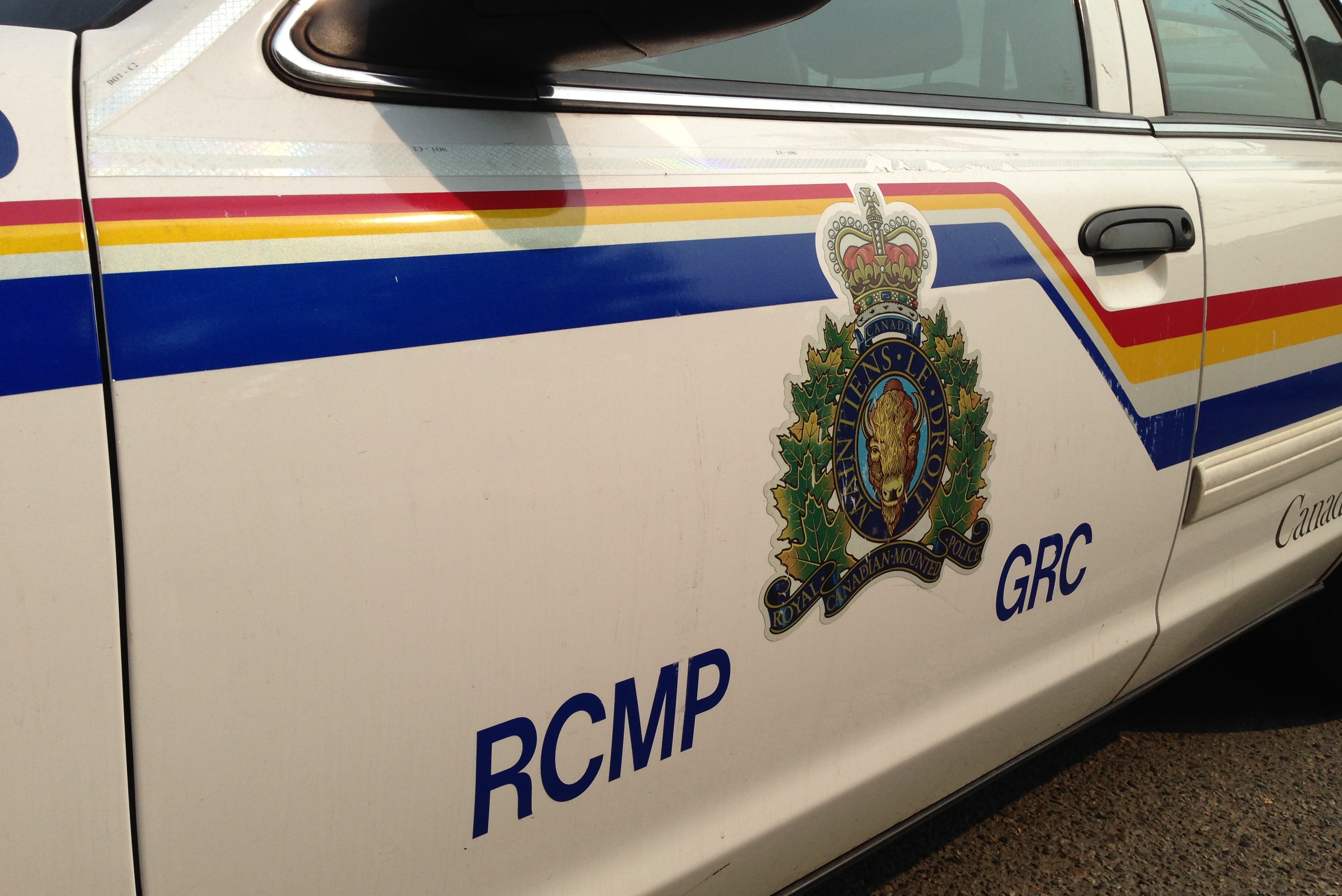 File: The side of an Alberta RCMP vehcile.
