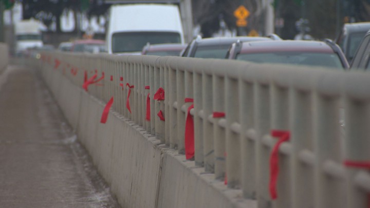 Red ribbons were tied to the University Bridge in Saskatoon Tuesday, meant to raise awareness for missing and murdered indigenous women in Canada.