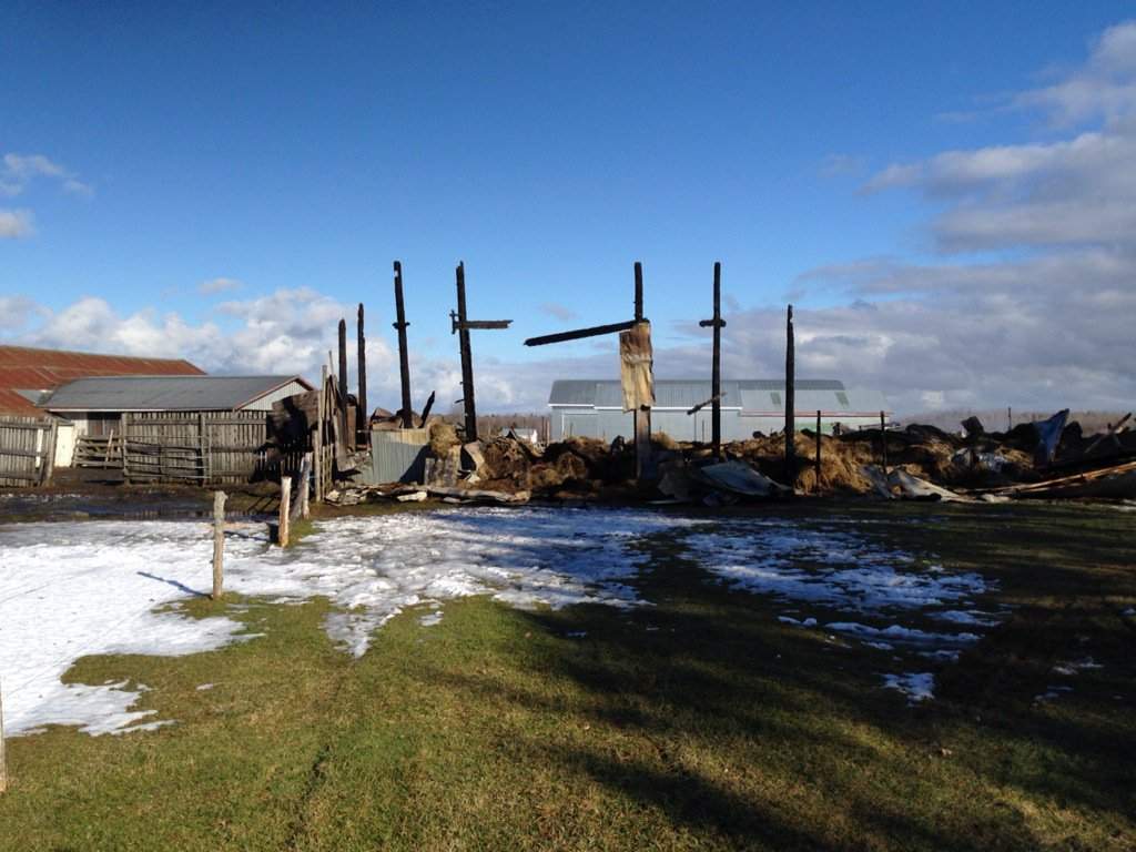 Marc Cormier’s 100-foot barn and two smaller barns are now rubble, and he said he also lost the water supply to his house.