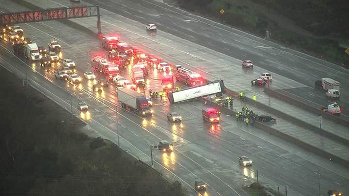 In this photo provided by KGO-TV, officials work at the scene of a fatal bus accident Tuesday, Jan. 19, 2016, in San Jose, Calif.