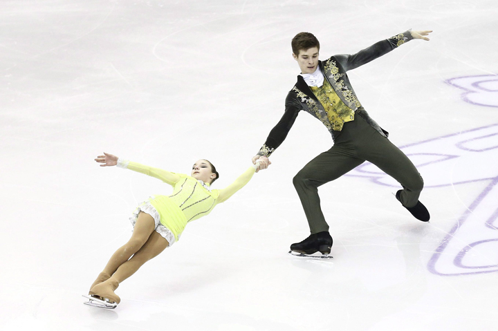 The pull of the male skater is the force that keeps the female skater moving in a circle.