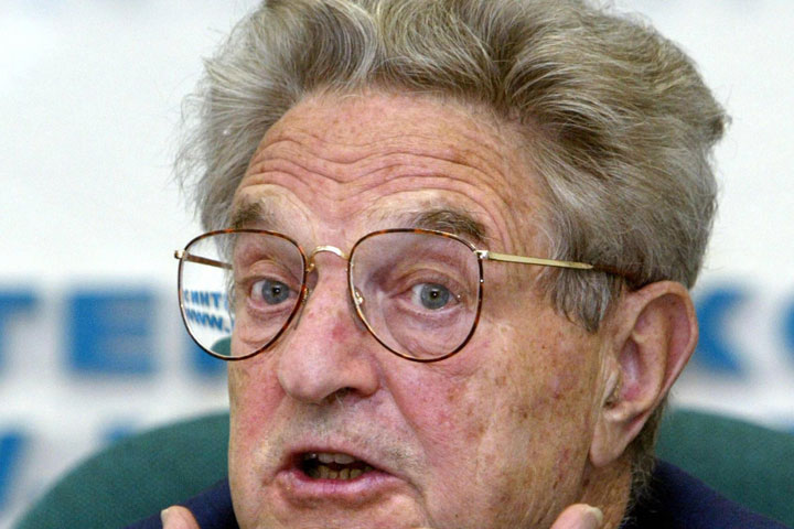 A file photo taken 09 June 2003 shows US financier George Soros gesturing during a press conference in Moscow. The Open Society Institute of billionaire US financier George Soros has been charged with tax evasion in the former Soviet republic of Kazakhstan, police said in Almaty, 28 December 2008.