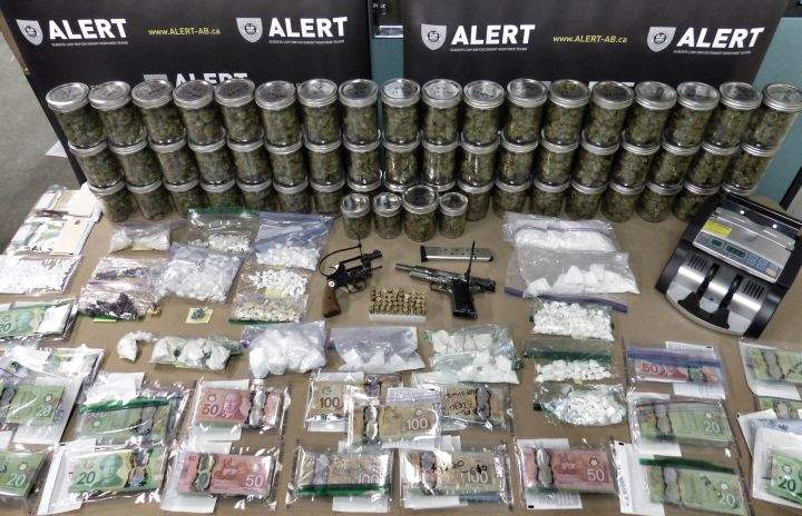 Items seized by ALERT after three residences were searched in Grande Prairie, Alta. Thursday, Jan. 21, 2016.
