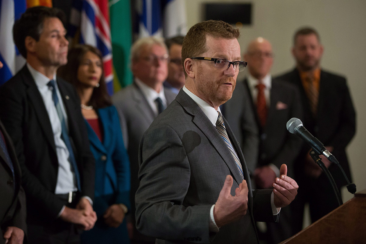 British Columbia Health Minister Terry Lake is flanked by his provincial and territorial counterparts while speaking during a news conference after the first day of a meeting of the ministers in Vancouver, B.C., on Wednesday January 20, 2016. 