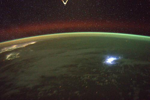 Lighting and aurora as seen from the International Space Station.