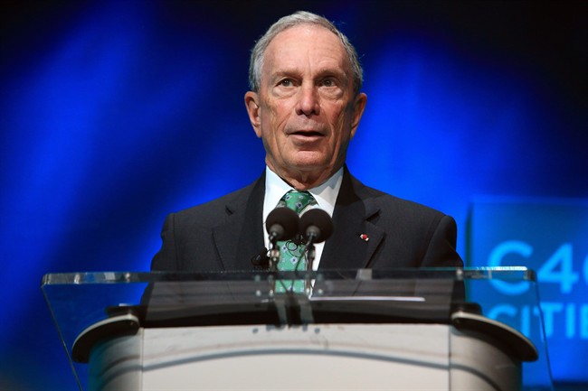 In this Dec. 3, 2015, file photo, former New York Mayor Michael Bloomberg speaks during the C40 cities awards ceremony, in Paris.